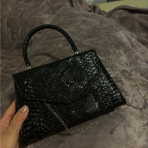 Black envelope purse by Fashion Nova